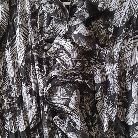 Style and company black and white blouse with ruffles down the center. - Picture 2 of 4